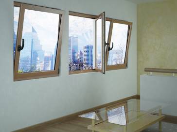 Ventana PVC europeo oscilobatiente color roble<br><a style="font-size:16px;" href="/portfolio/tina_bat_plus_low/">+ Ver producto</a>